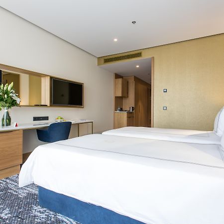 Swissotel SJJ Exterior foto A room at the hotel